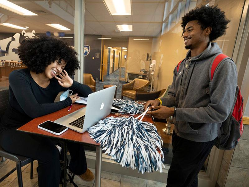 Two Students Laughing